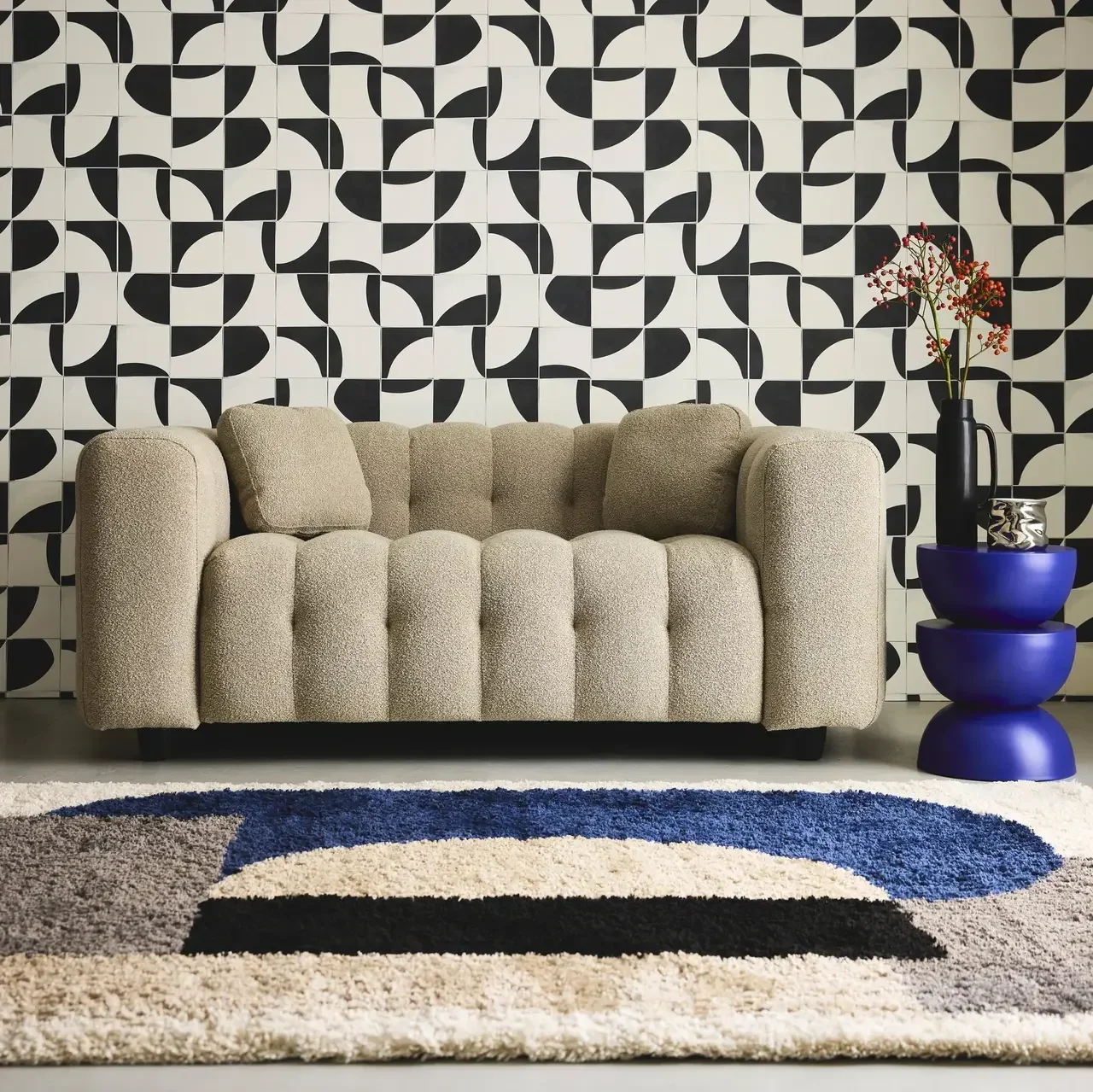 Canapé 2 places tissu bouclette capitonné texturé design contemporain