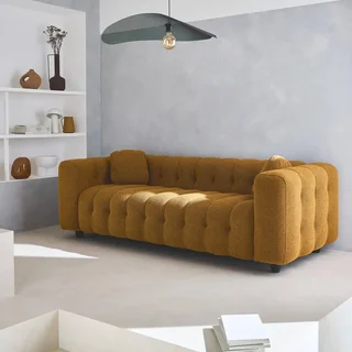 Divano moderno capitonné in bouclé texture beige a 3 posti