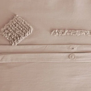 Parure coton lavé rose poudré 2 personnes tufté motifs géométriques