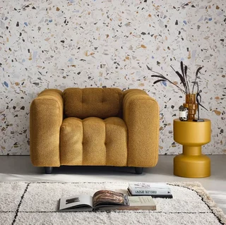 Fauteuil capitonné bouclette texturée design contemporain salon