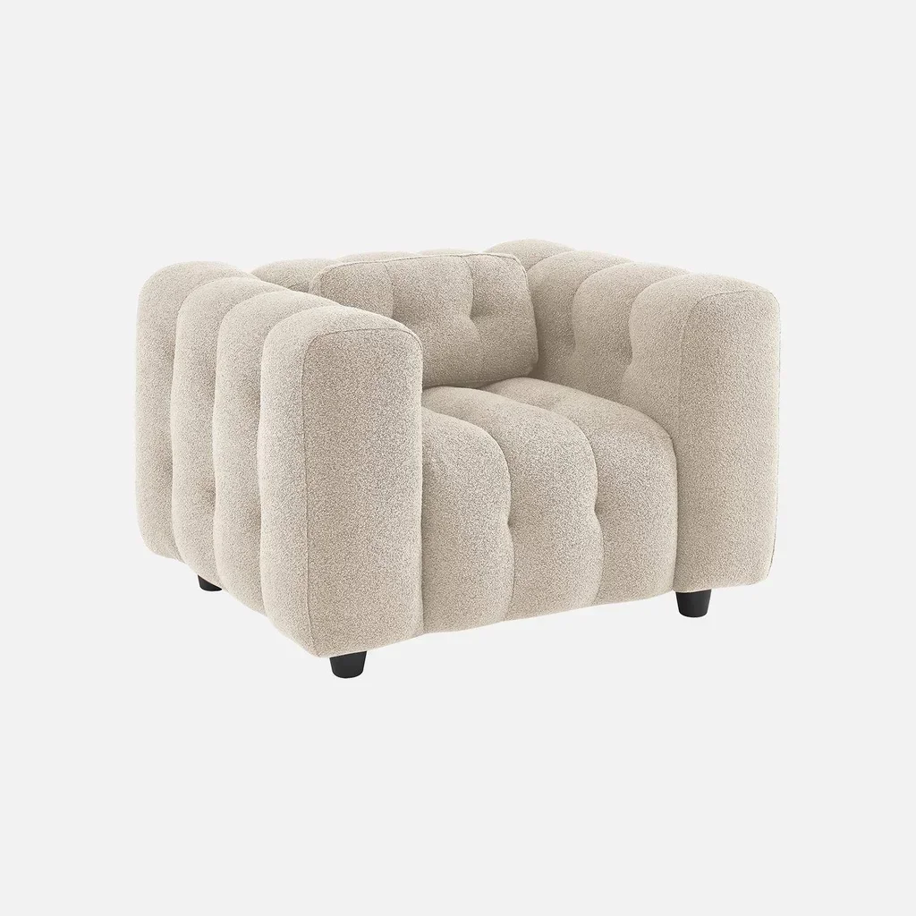 Fauteuil capitonné en bouclette texturé design contemporain