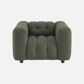 Fauteuil capitonné bouclette texturée beige design contemporain salon confort