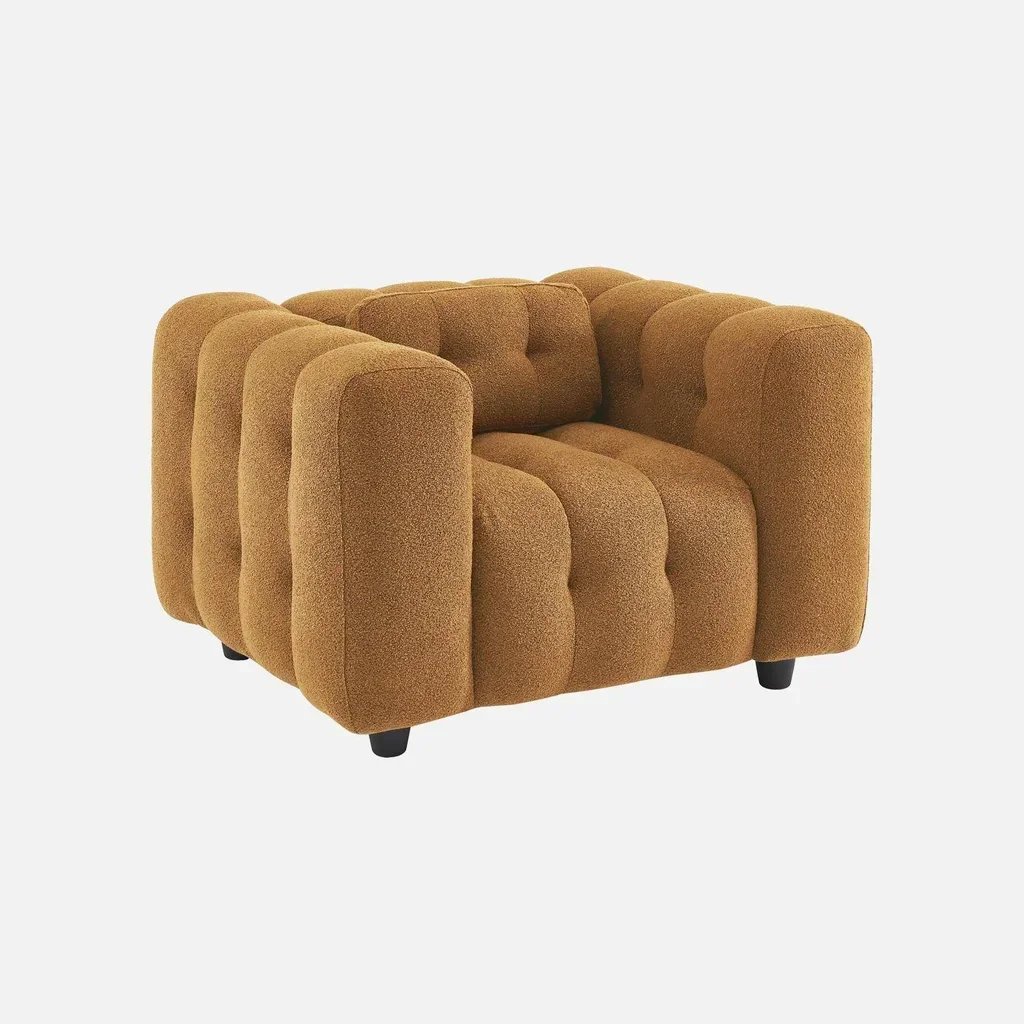 Fauteuil capitonné bouclette texturée design contemporain salon