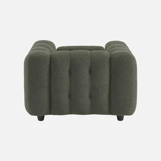 Fauteuil capitonné bouclette texturée beige design contemporain salon confort