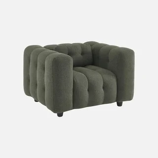 Fauteuil capitonné bouclette texturée beige design contemporain salon confort
