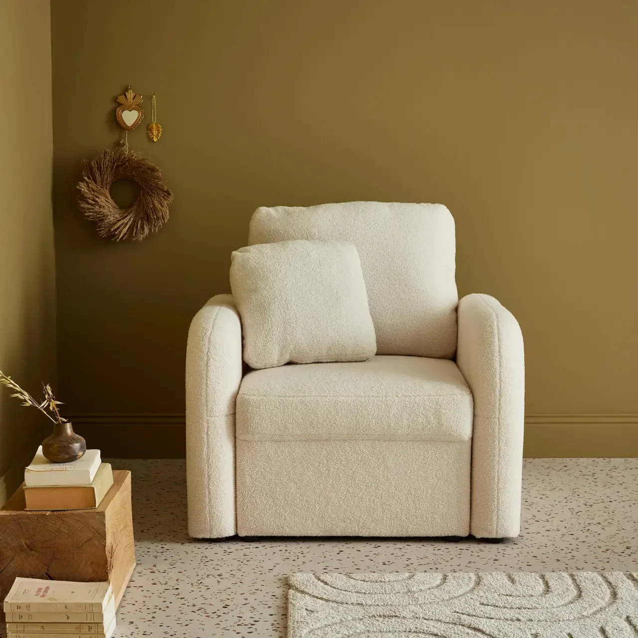 Fauteuil Milano tissu bouclette arrondi cosy moderne salon