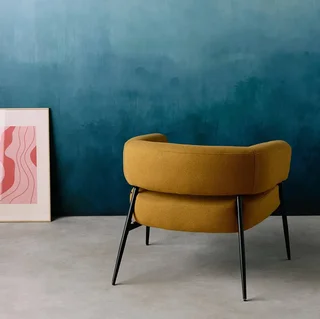 Fauteuil tissu dossier cintré piétement métallique Cristo