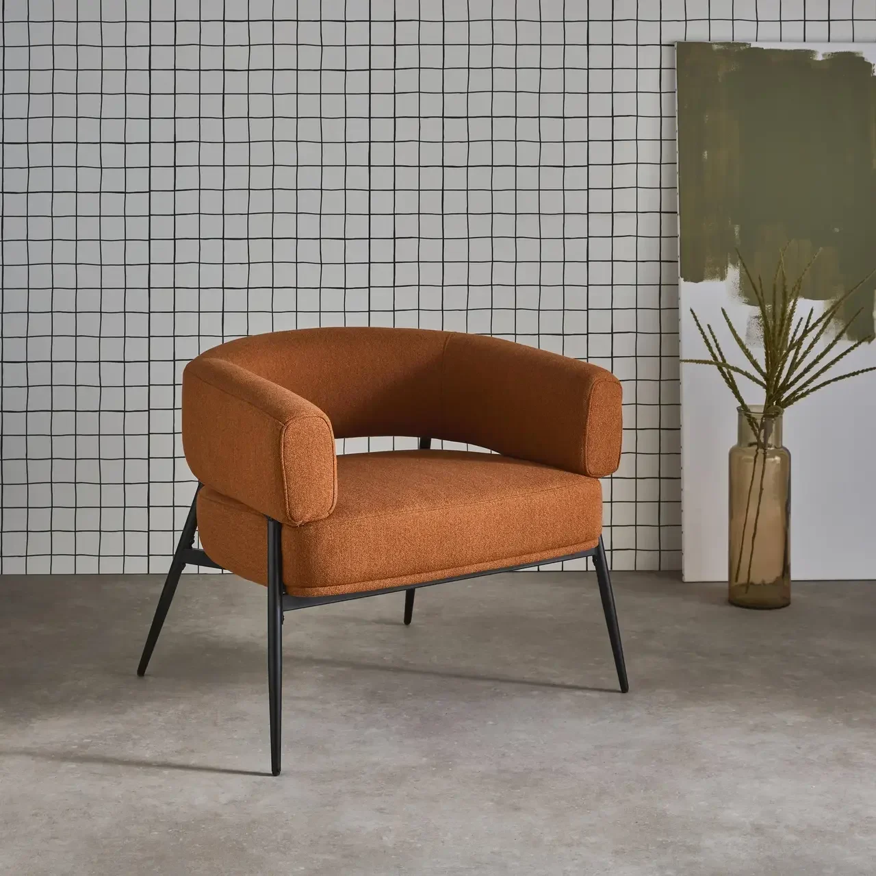 Fauteuil Cristo tissu dossier cintré piétement métallique contemporain