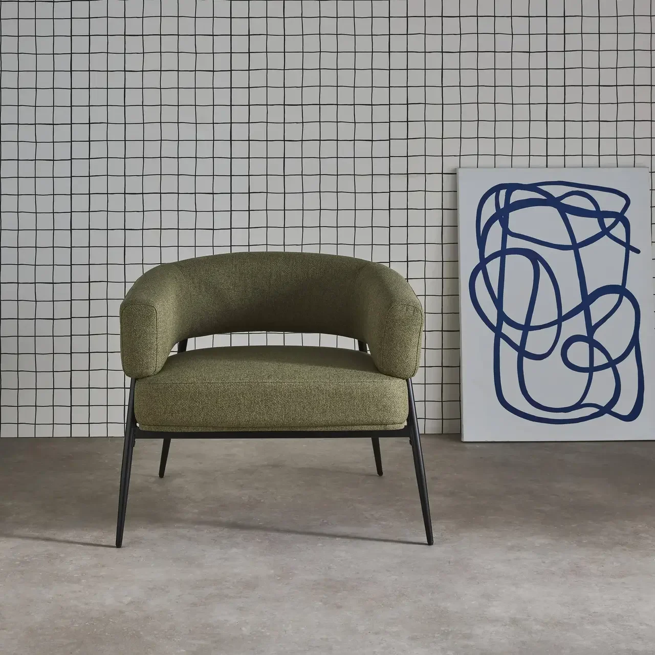 Fauteuil design Cristo tissu dossier incurvé piétement métal salon cosy