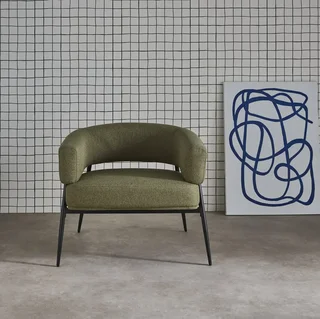 Fauteuil design Cristo tissu dossier incurvé piétement métal salon cosy