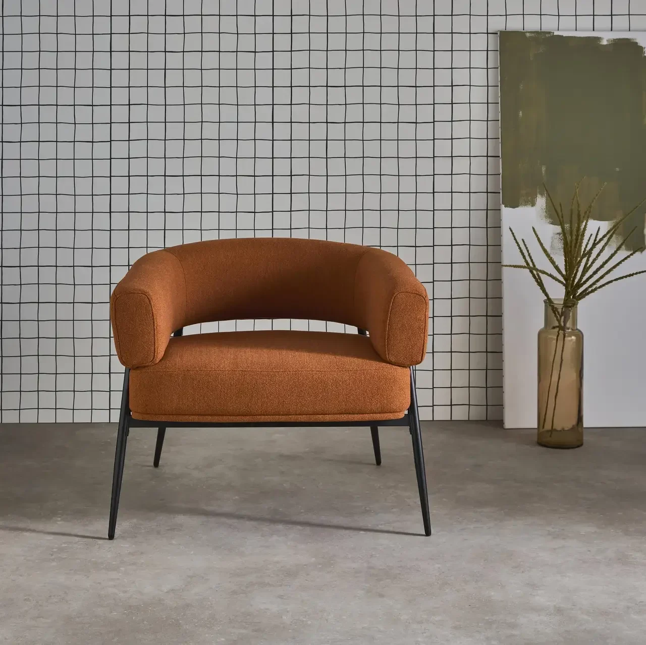 Fauteuil Cristo tissu dossier cintré piétement métallique contemporain