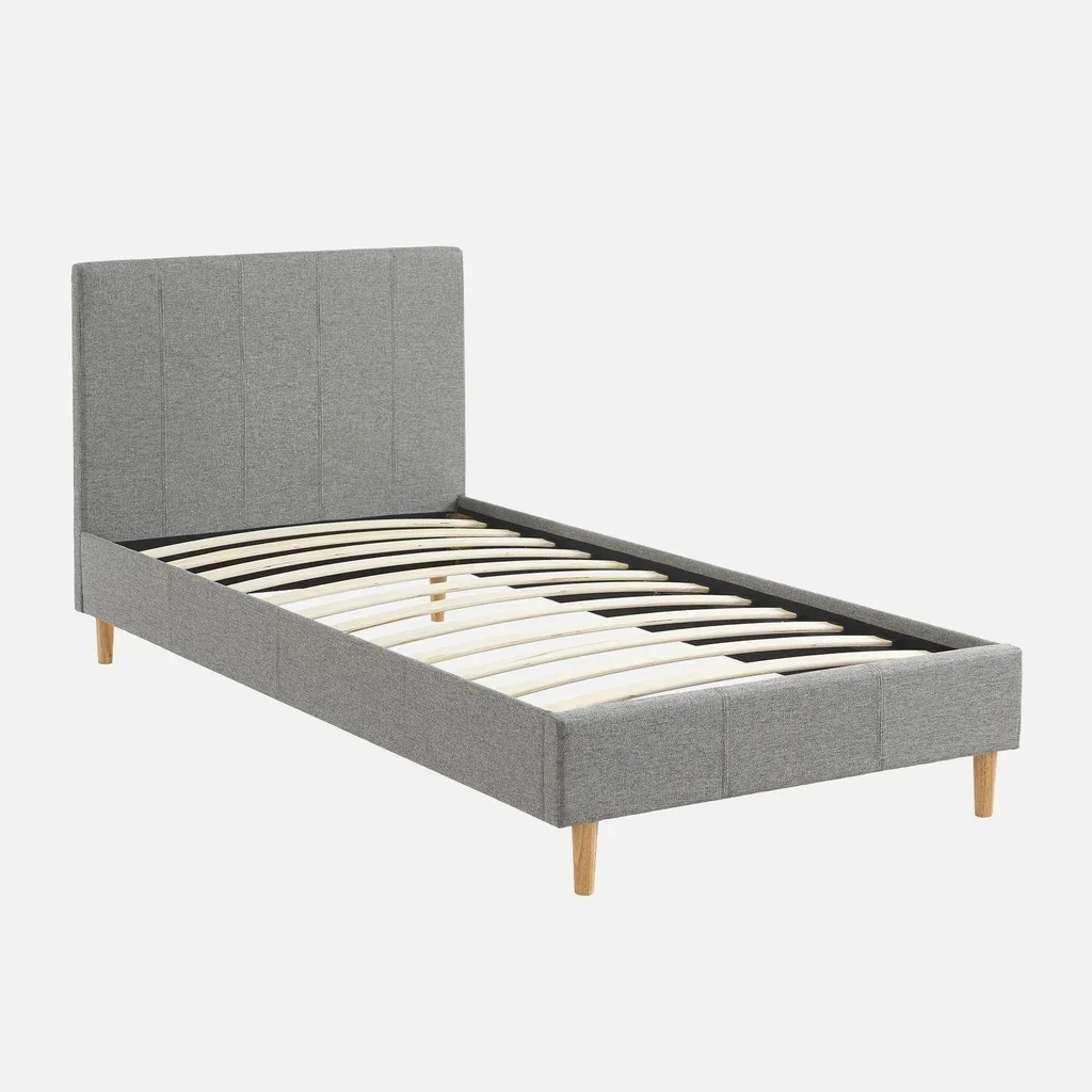 Letto 90x190 cm Marlon tessuto con rete a doghe e testiera