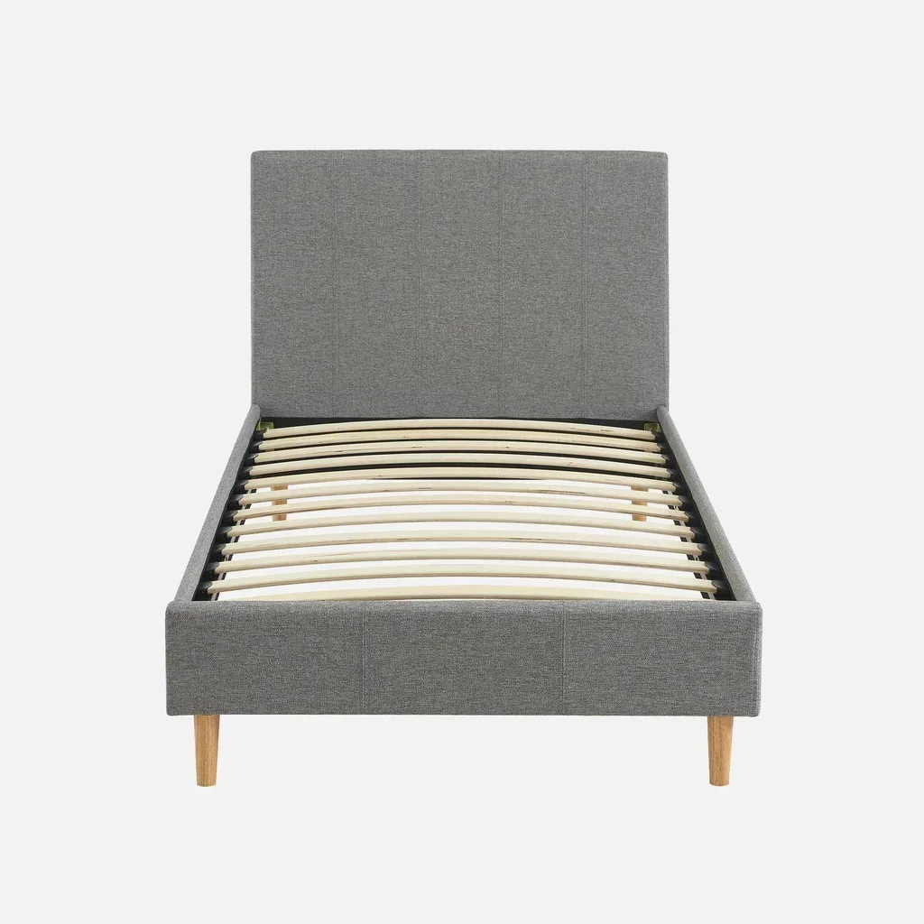 Letto 90x190 cm Marlon tessuto con rete a doghe e testiera