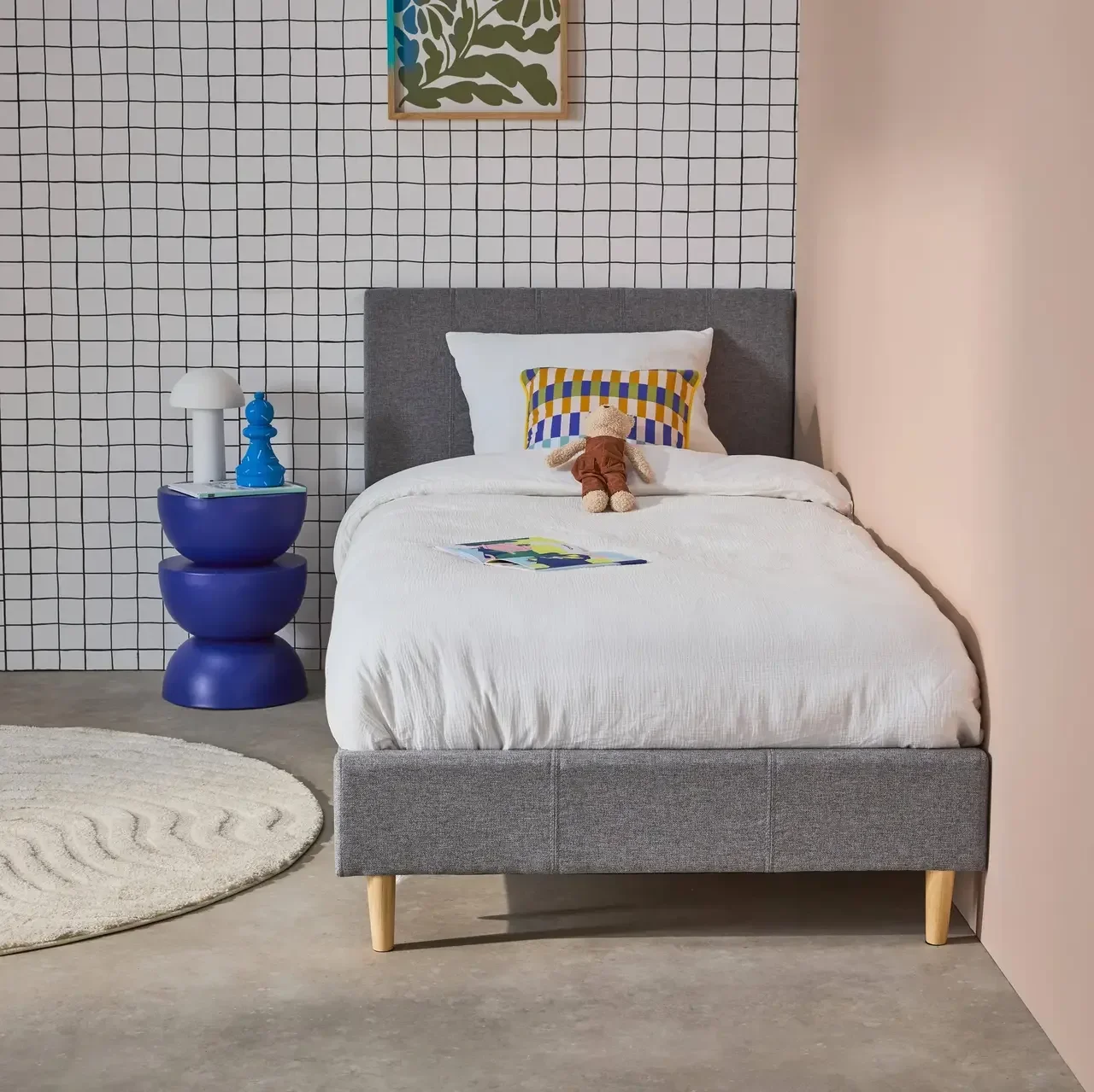 Letto 90x190 cm Marlon tessuto con rete a doghe e testiera