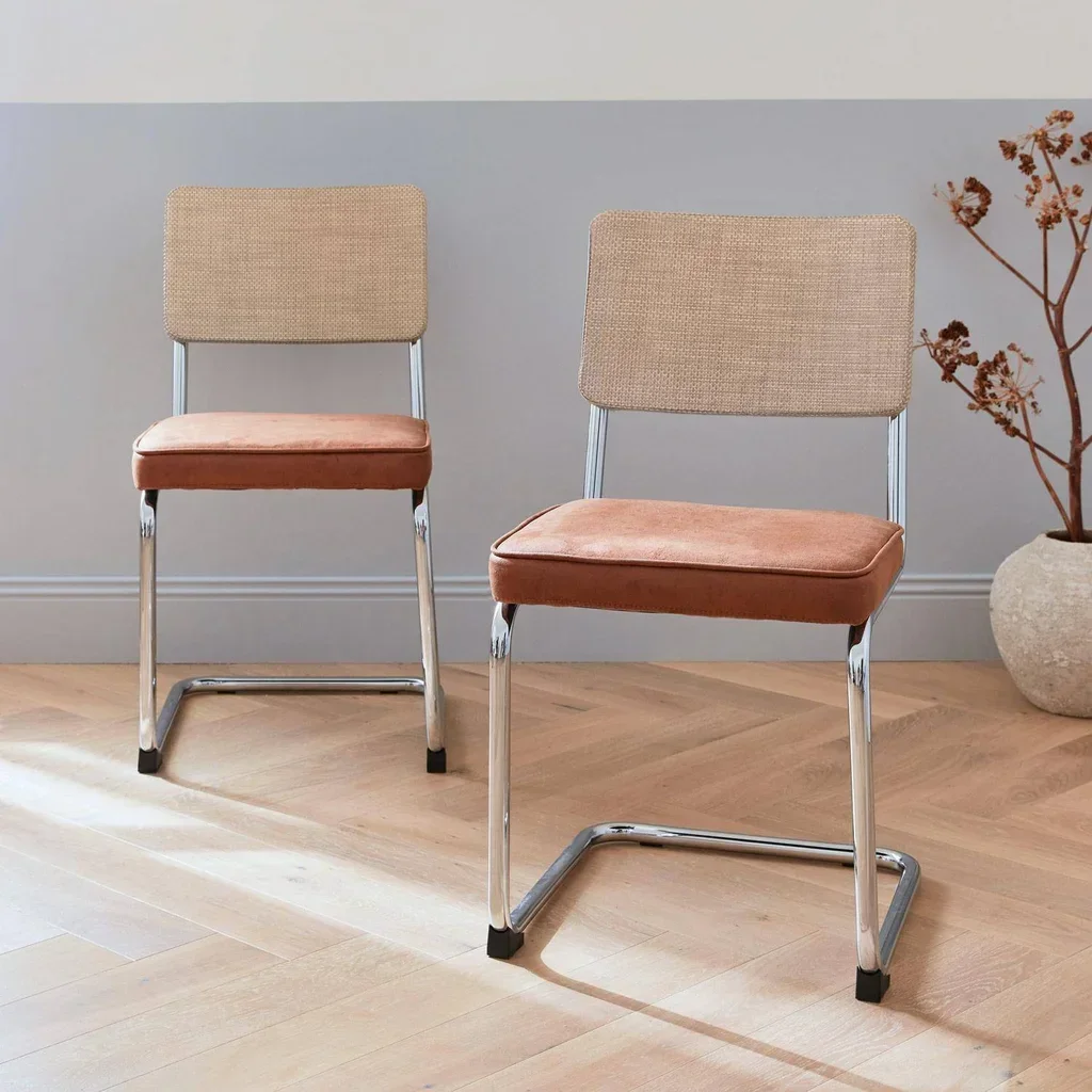 2 chaises cantilever tissu structure acier rotin vintage