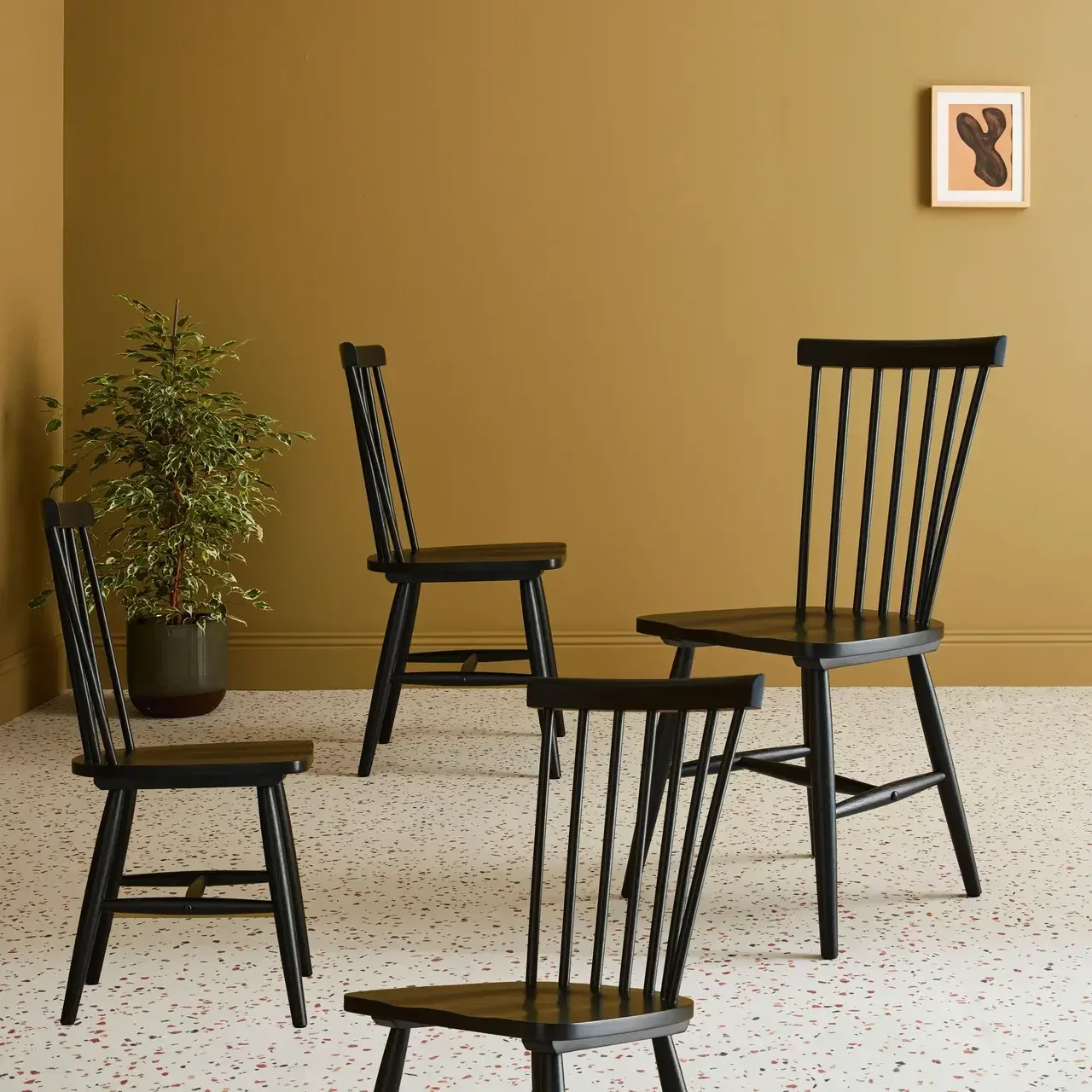 4 chaises Romie hévéa massif barreaux dossier incurvé