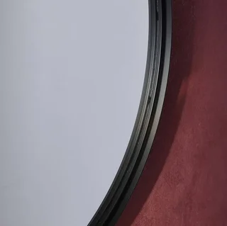 Miroir circulaire en métal Mabel 60 cm - Décoration murale moderne et élégante
