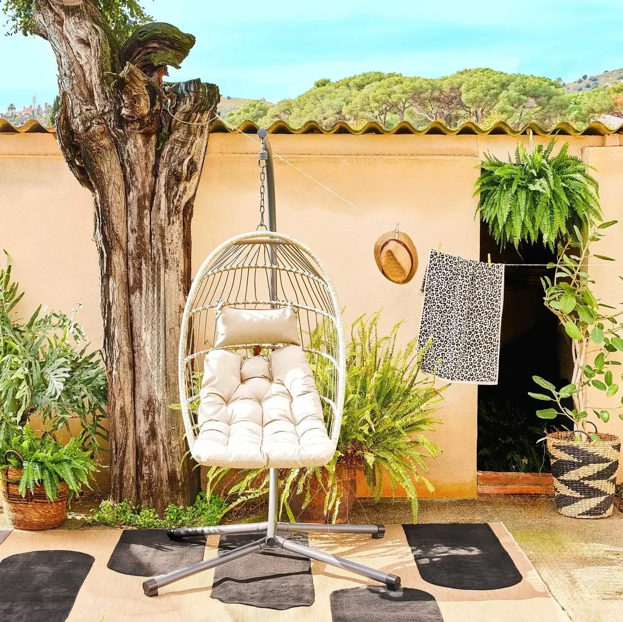 Œuf suspendu Toscana acier osier coussin jardin