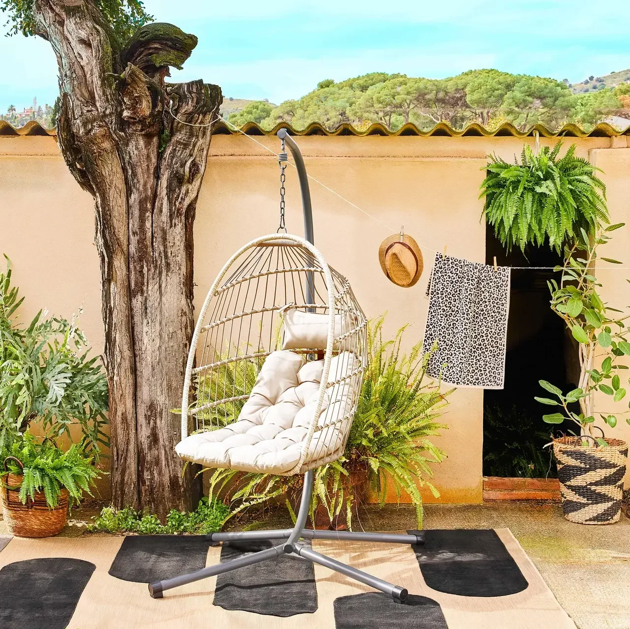Œuf suspendu Toscana acier osier coussin jardin