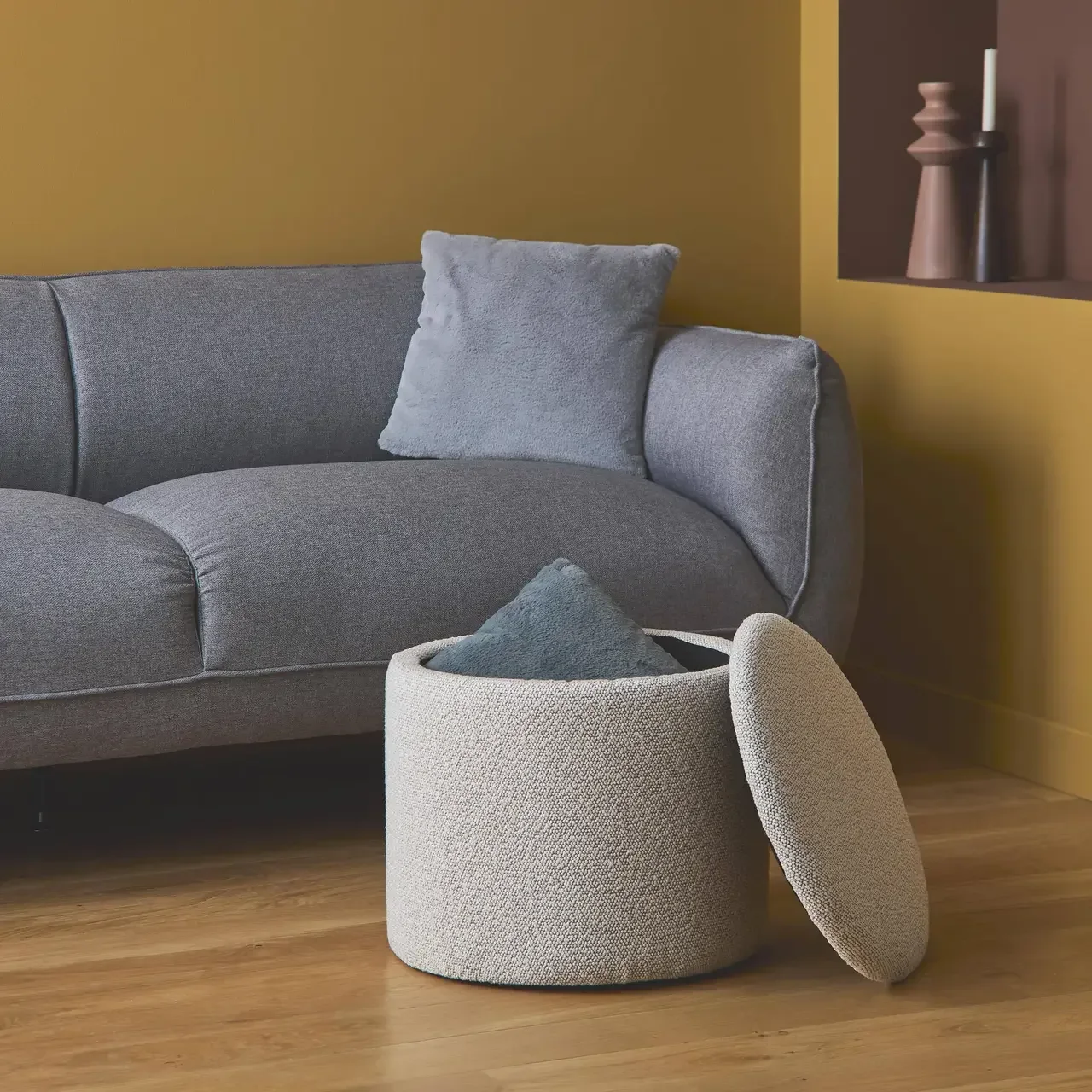 Pouf de rangement en tissu kaki foncé avec espace de rangement intégré