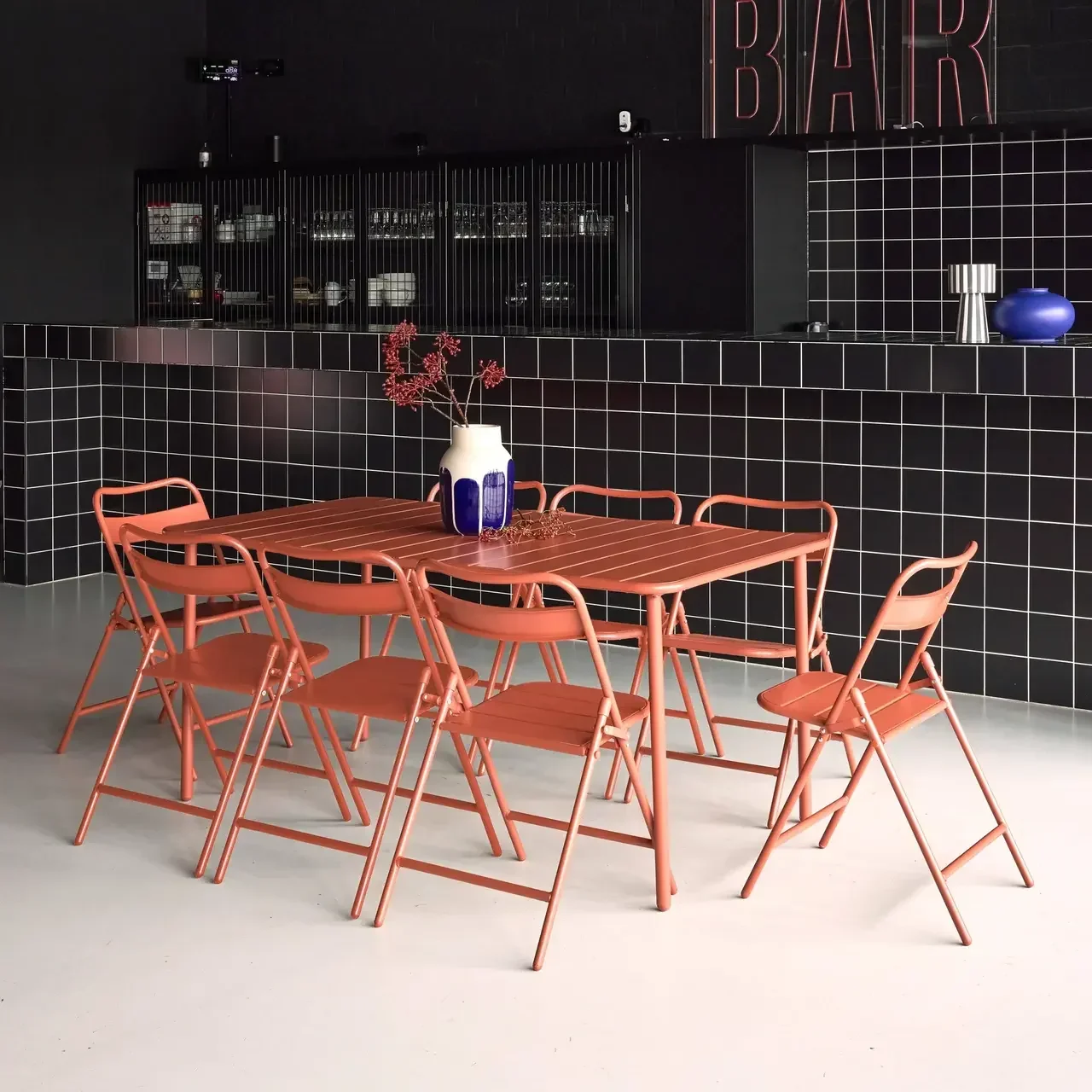 Ensemble table jardin Amélia 8 chaises pliantes terracotta acier antirouille