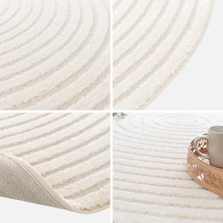 Tappeto rotondo crema motivi circolari rilievo interno elegante