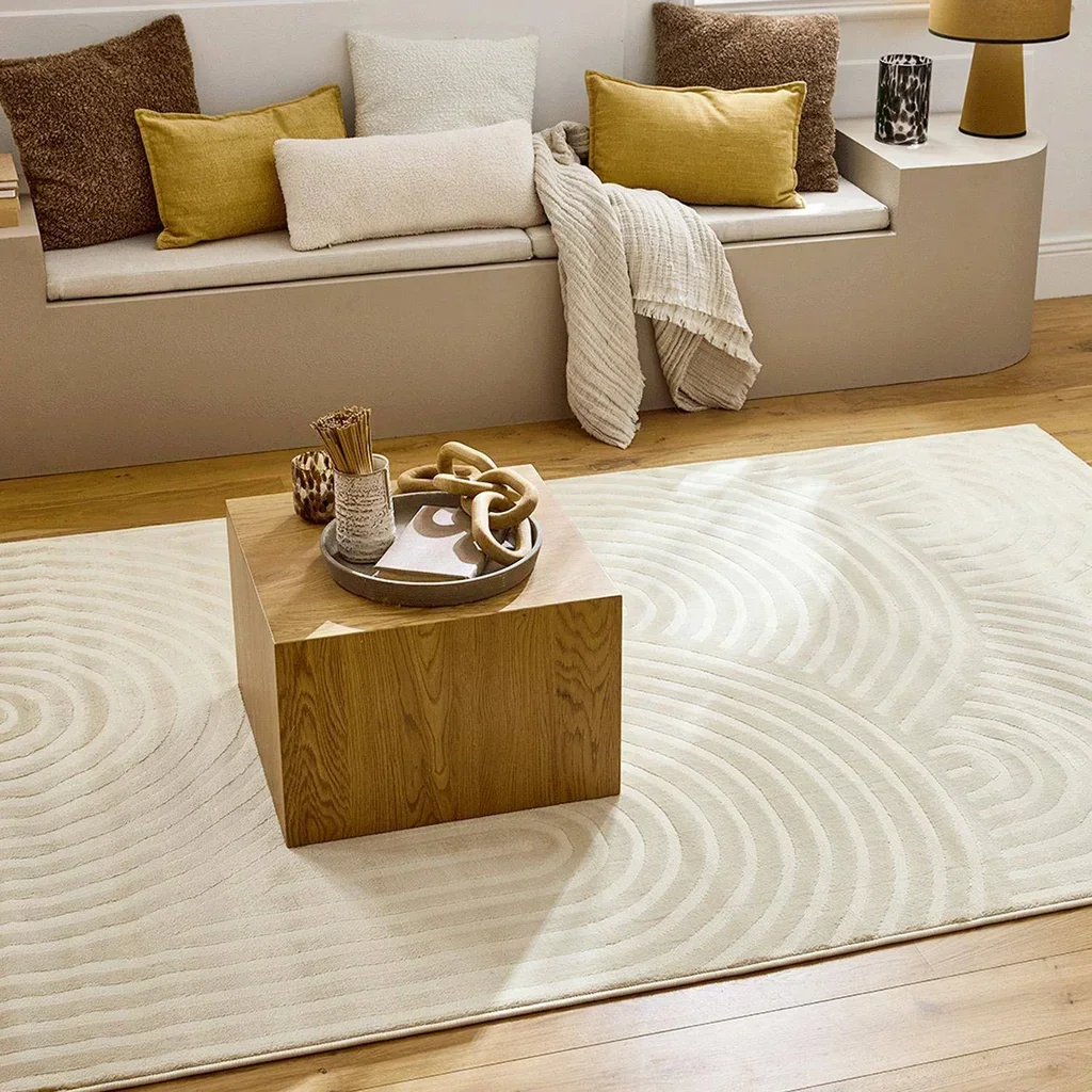 Alfombra salón beige crudo diseño moderno relieve suave arcos