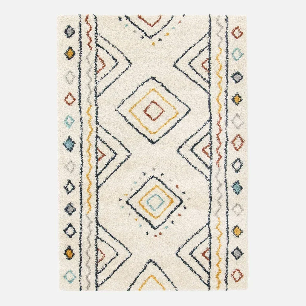 Tapis berbère crème bleu orange motif ethnique salon intérieur