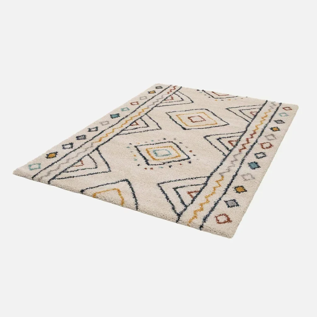 Tapis berbère crème bleu orange motif ethnique salon intérieur