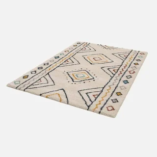 Tapis berbère crème bleu orange motif ethnique salon intérieur
