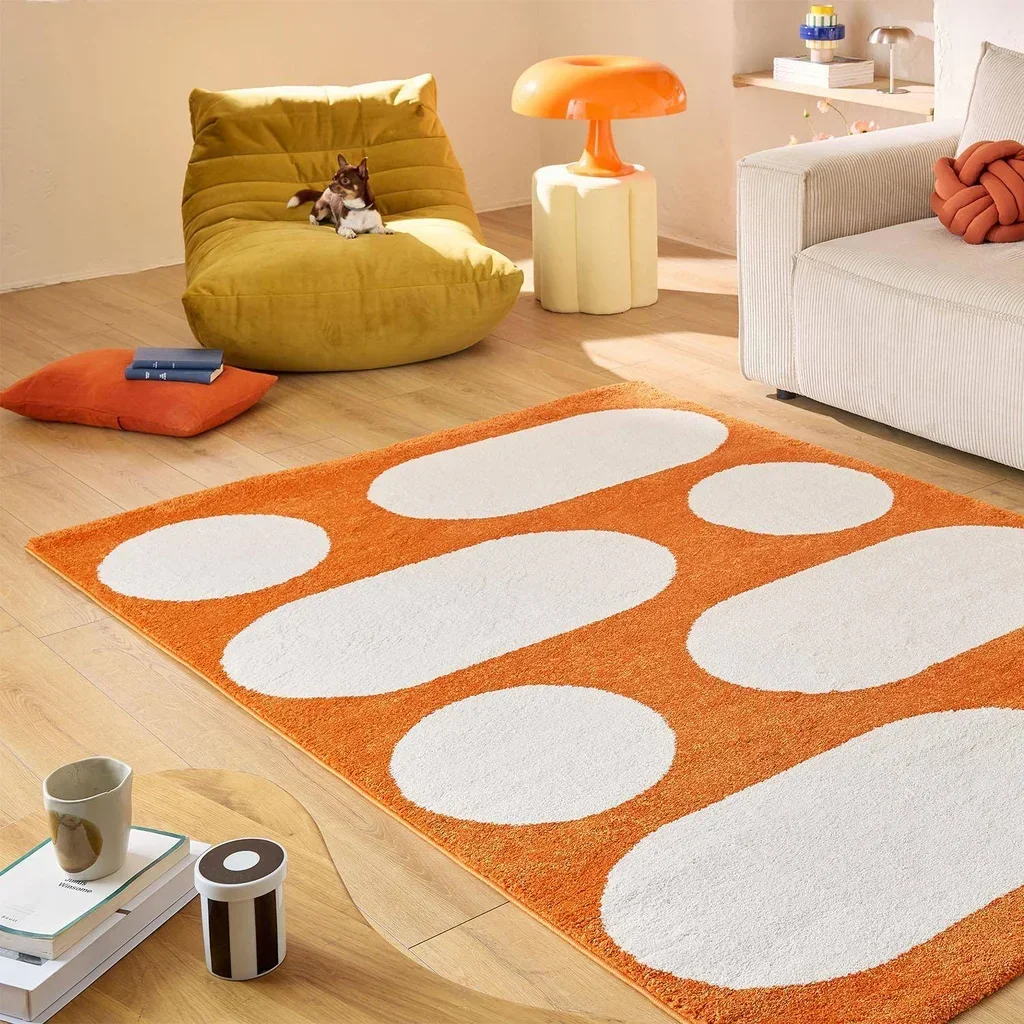 Tapis salon orange poils longs motif géométrique moderne