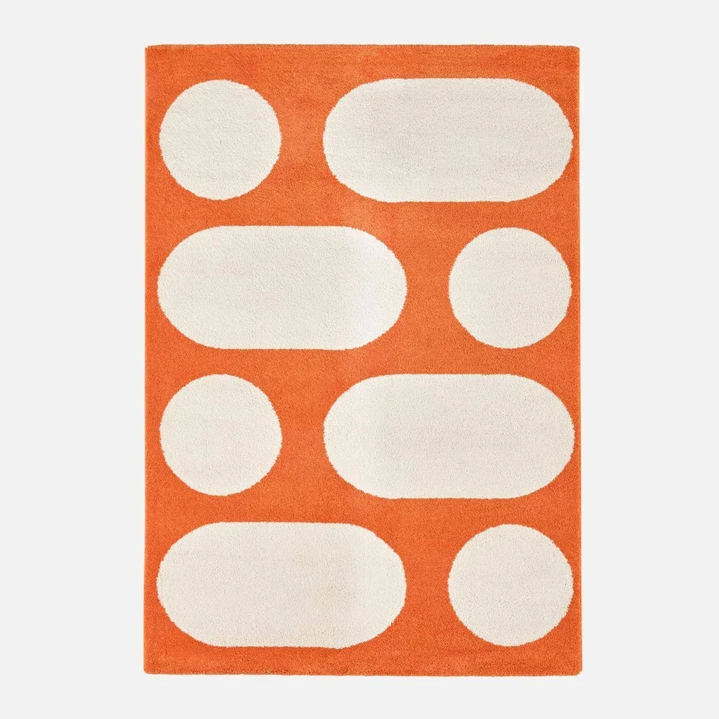 Tapis salon orange poils longs motif géométrique moderne