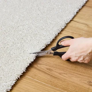 Tapis salon velours frisé crème sur mesure doux et élégant